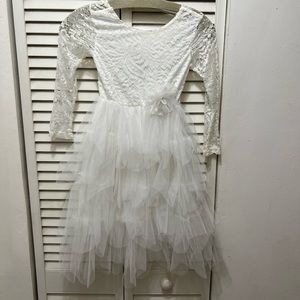 Girl’s white party ruffle dress